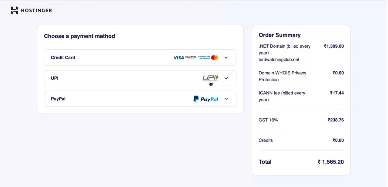 The payment screen. The Order Summary breaks the total into the domain charge, WHOIS privacy protection, the annual ICANN fee, and tax.