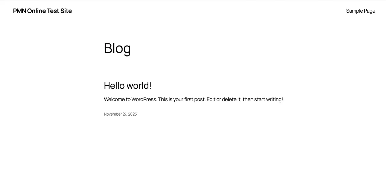 A freshly created local WordPress site, showing the default "Hello world!" post — proof the install completed and the site is running.