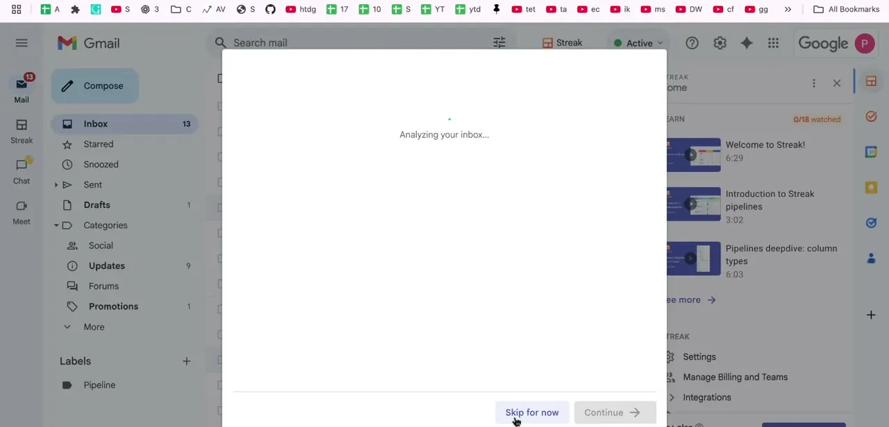 Streak's onboarding running inside Gmail, briefly analyzing the inbox before handing off to pipeline setup.