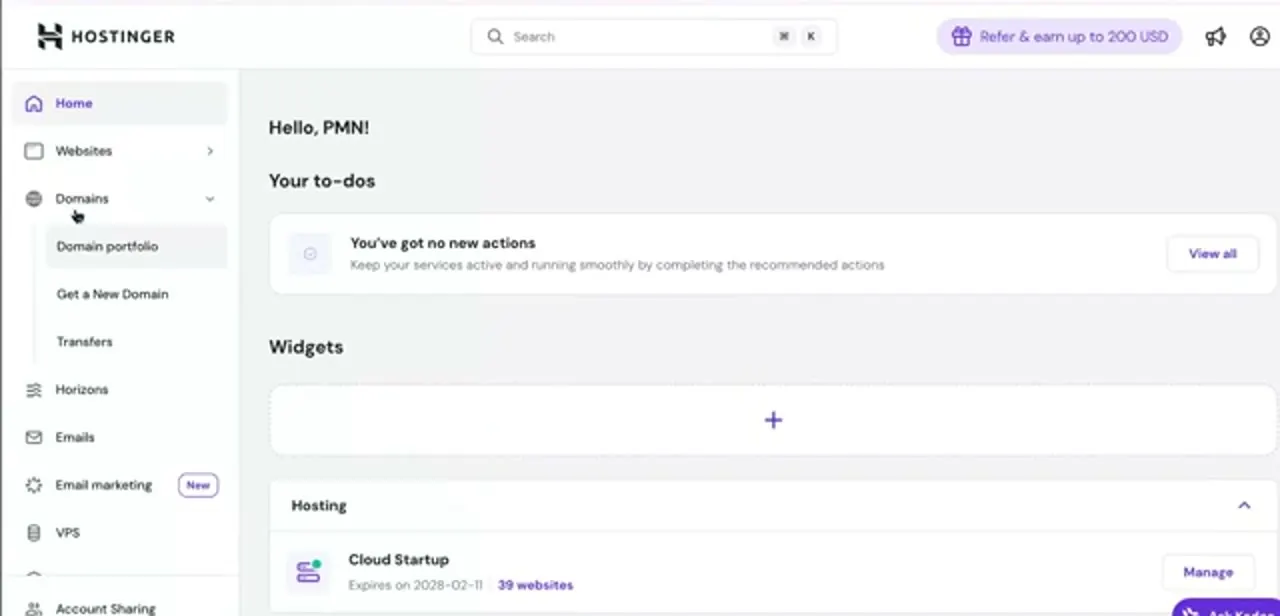 The Hostinger dashboard with Domains expanded, showing Domain portfolio, Get a New Domain, and Transfers.