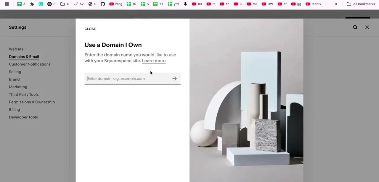 The "Use a Domain I Own" panel in Squarespace's Domains & Email settings, where you type in the exact domain name to connect.