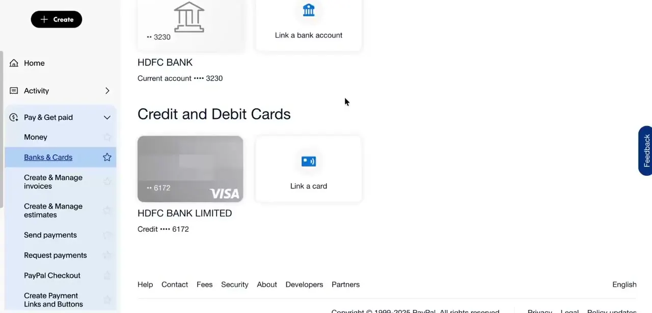 The Banks & Cards page, listing a linked bank account and a Visa credit card, the place to confirm your payment method is recognized and confirmed before you retry.