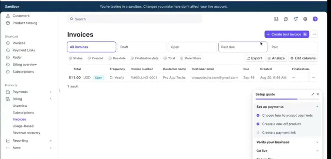 The Invoices list filtered by status, with one open yearly invoice and Stripe's setup guide panel in the corner.