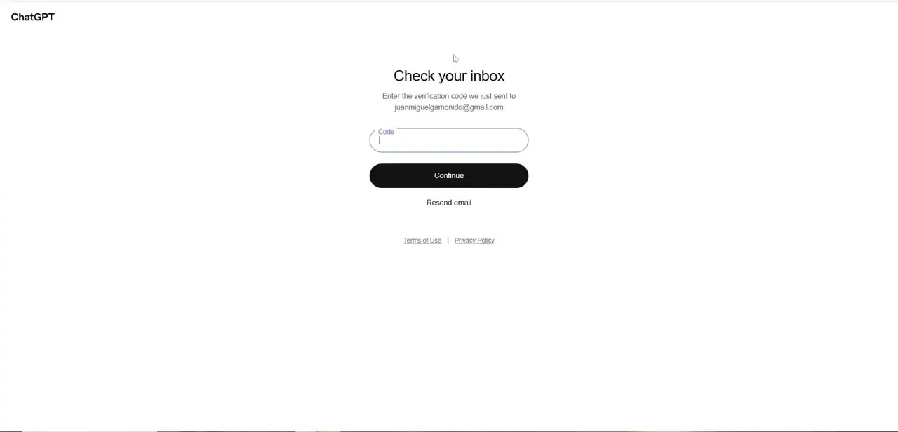 The "Check your inbox" verification step, asking for the one-time code sent to your email before signing in.